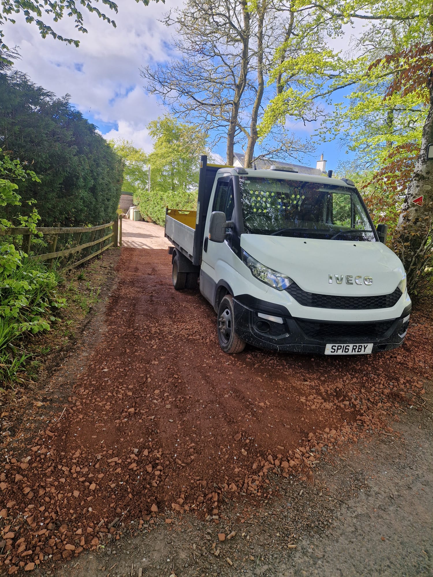 Completed pea-gravel driveway in front of a Perthshire cottage, freshly laid and levelled